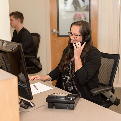 the-receptionist-talking-on-the-phone