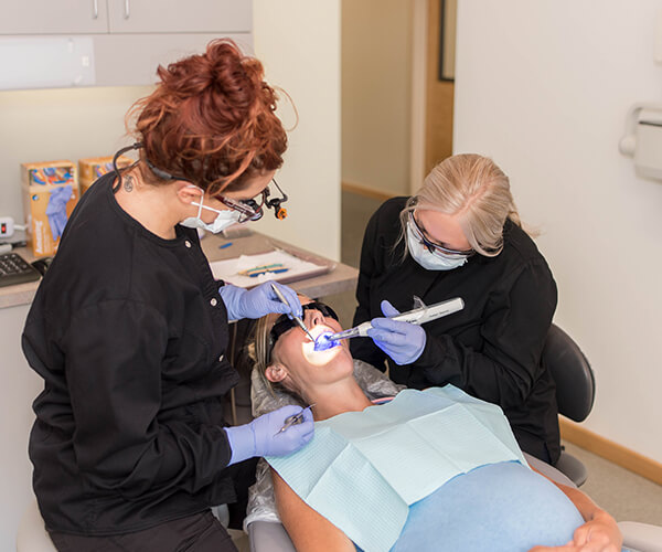 using-a-laser-in-a-patients-mouth by dentist in Port Angeles, WA - Root Canals