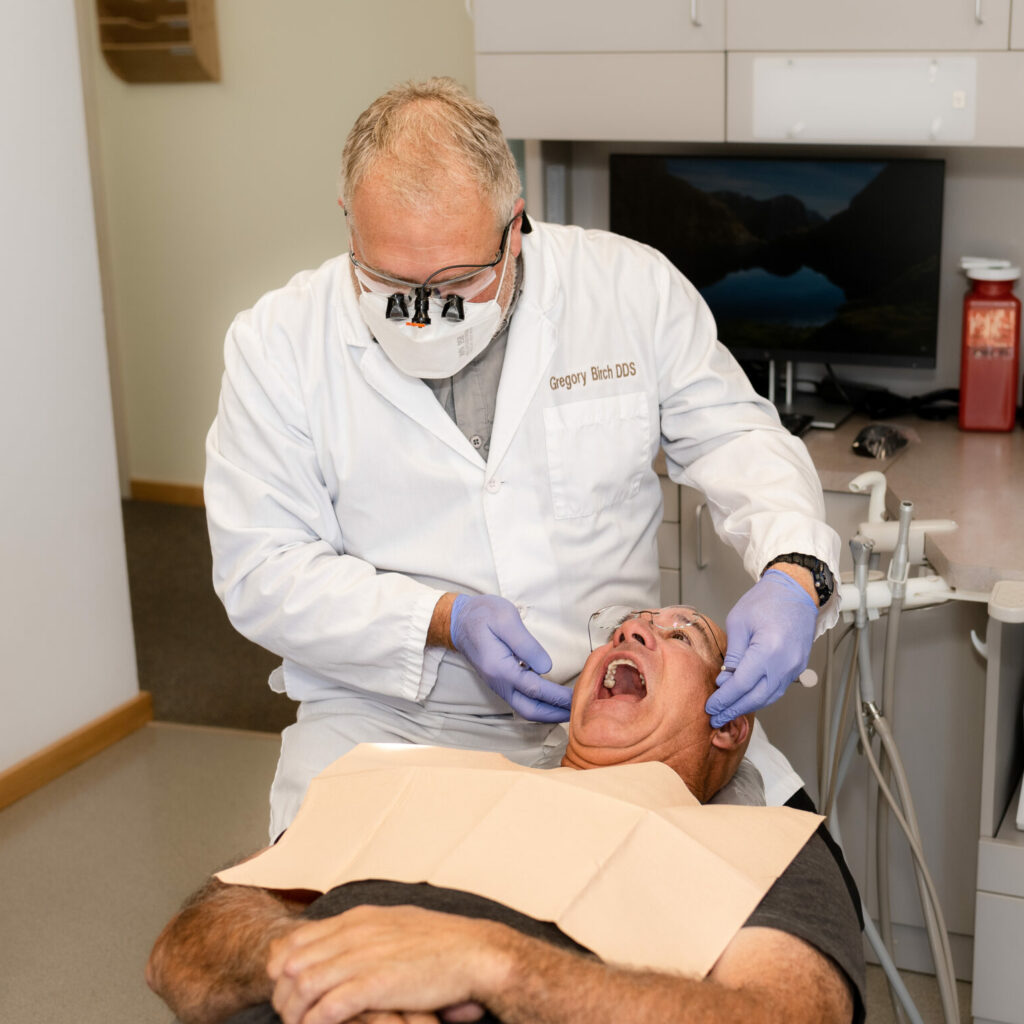 Dentist checks patient teeth in Port Angeles, WA